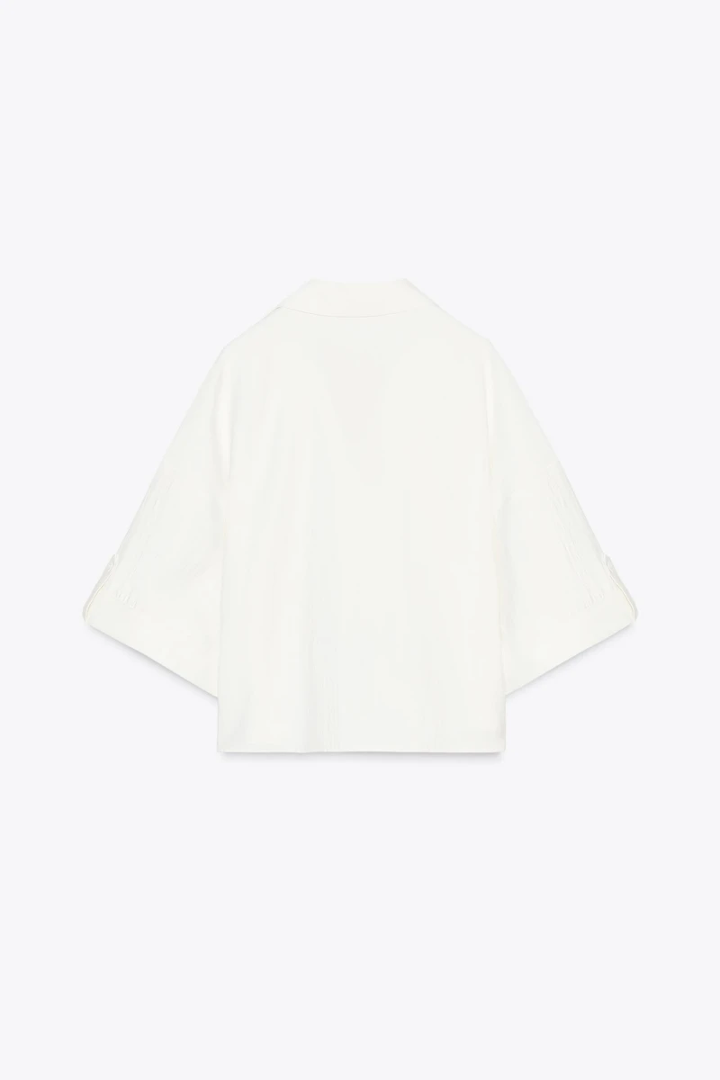 CHEMISE MANCHES COURTES LARGES