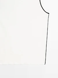 Knit top with contrast detail