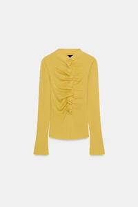 GILET DRAPÉ EN MAILLE