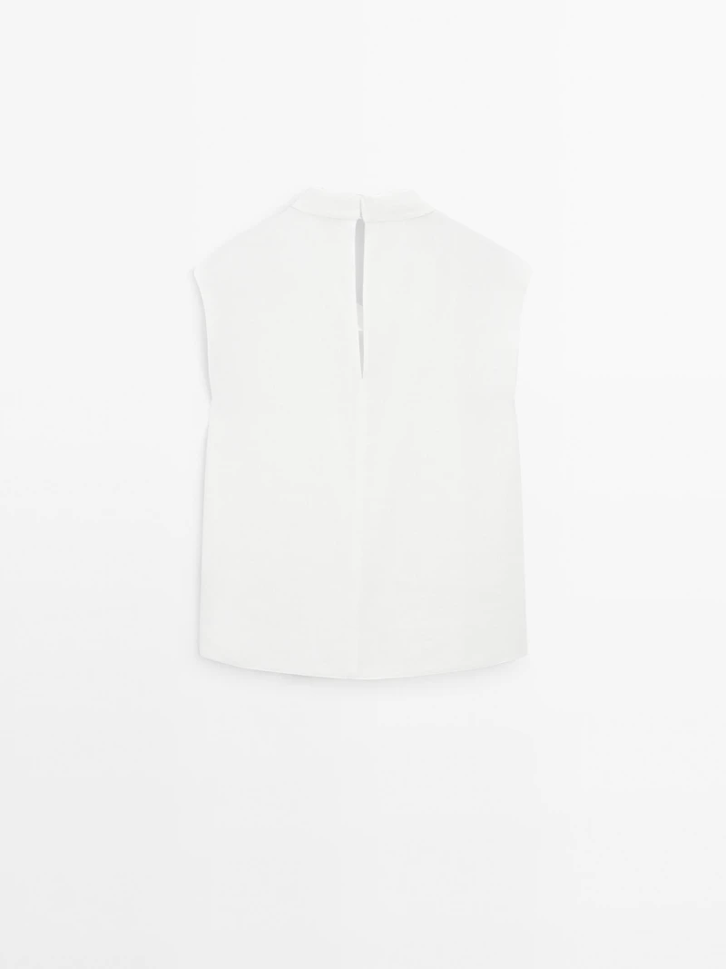 Flowing blouse with draped collar