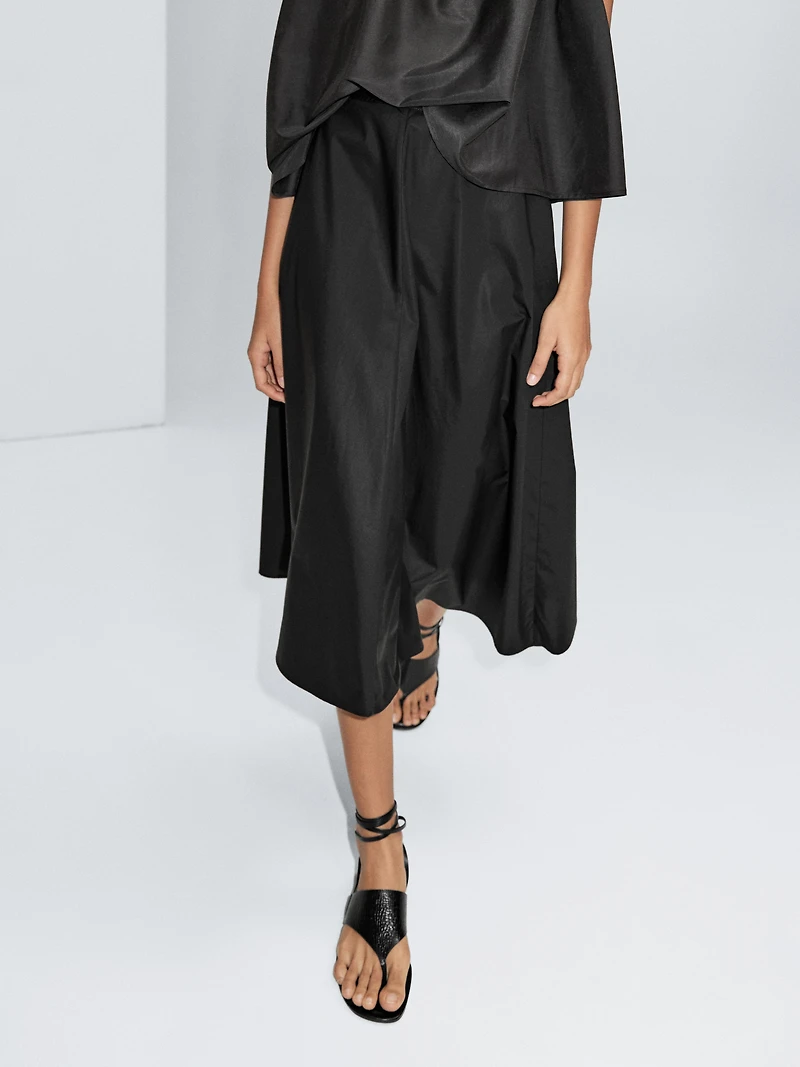 Jupe midi taille marquée