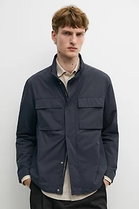 Technical fabric jacket with pocket details