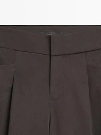 Wide-leg pleated trousers