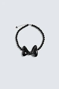 BOW NECKLACE HARRY LAMBERT FOR ZARA X DISNEY