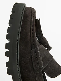 Split leather loafers with tassels and track sole