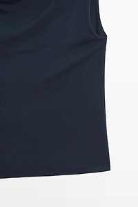 Asymmetric drop sleeve top