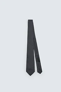 CRAVATE JACQUARD GÉOMÉTRIQUE 100% SOIE
