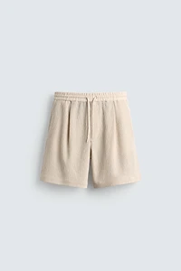 RELAXED FIT EMBOSSED SHORTS