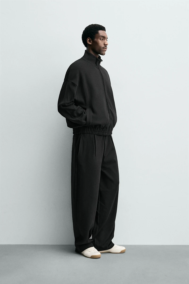 PLEATED WIDE FIT JOGGER PANTS