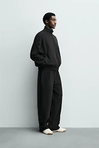 PLEATED WIDE FIT JOGGER PANTS