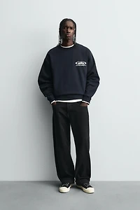 COMBINATION PRINT SWEATSHIRT