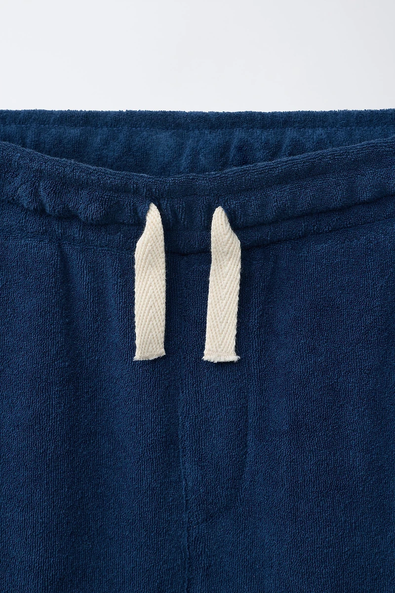 ENSEMBLE POLO ET BERMUDA EFFET ÉPONGE