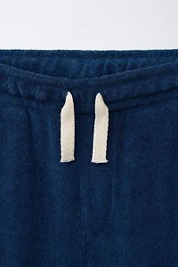 ENSEMBLE POLO ET BERMUDA EFFET ÉPONGE