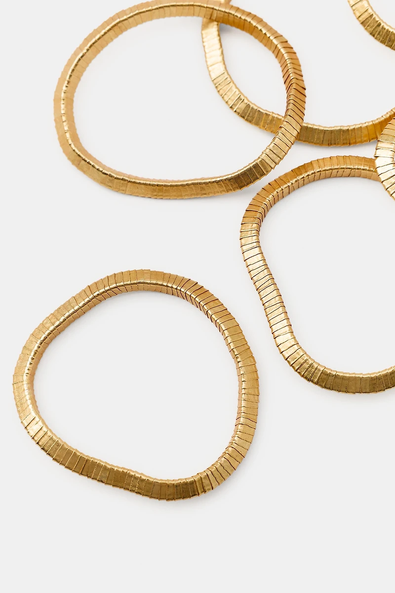 PACK OF ELASTIC BRACELETS WITH METAL PIECES