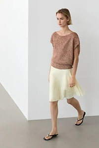Cotton blend knit top with ribbed hem