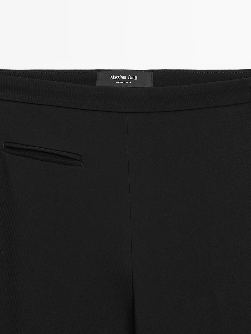 Flared trousers with pocket