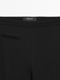 Flared trousers with pocket