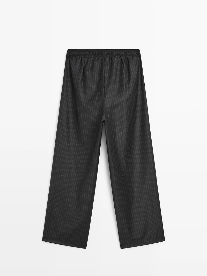 Darted pinstripe trousers