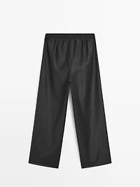 Darted pinstripe trousers