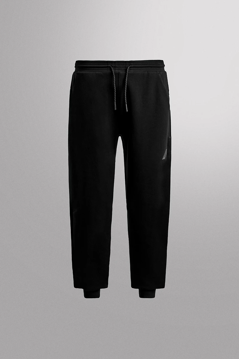 TECHNICAL ZIP PANTS