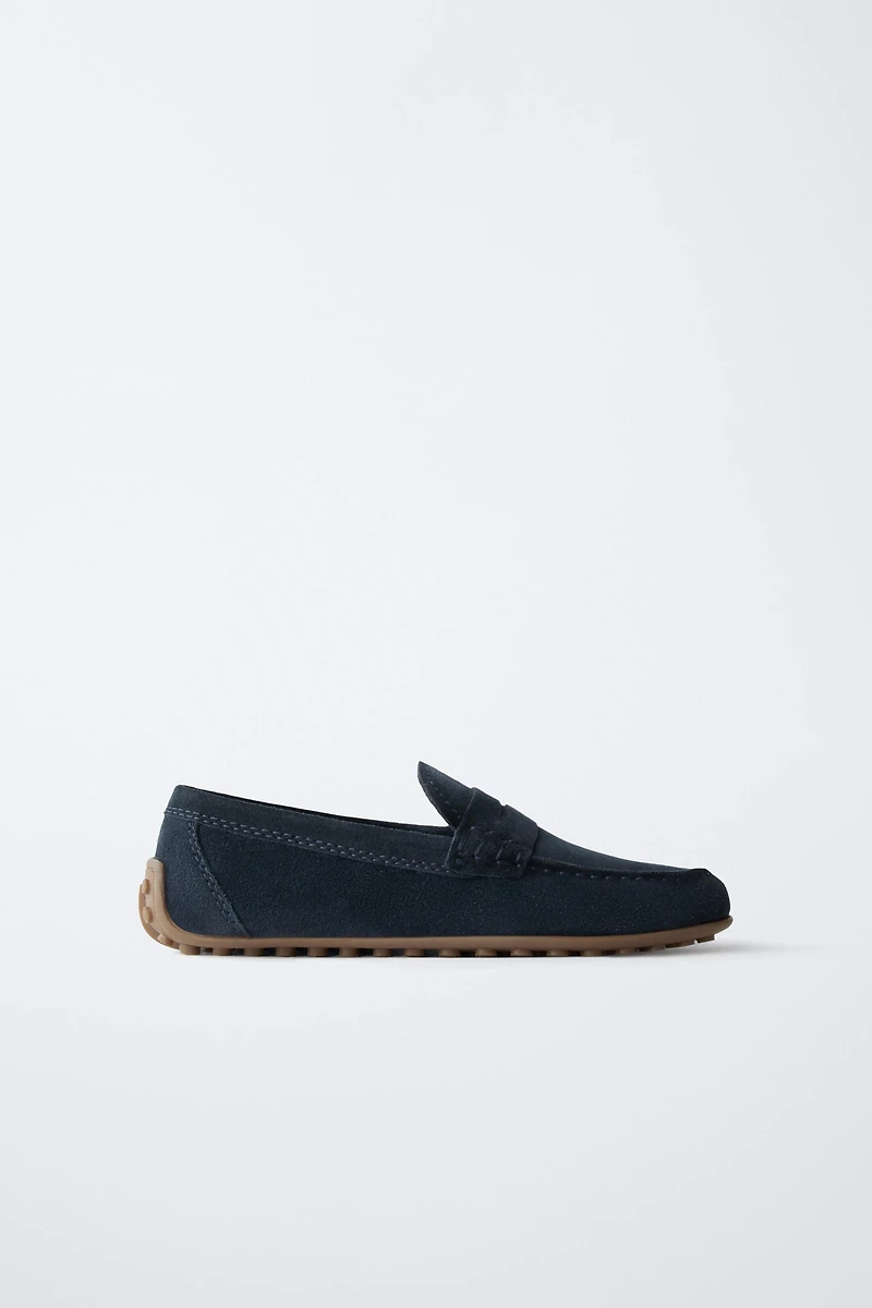 MOCASSINS EN CROÛTE DE CUIR