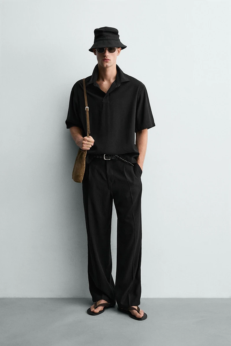 FLOWY RELAXED FIT PLEATED PANTS