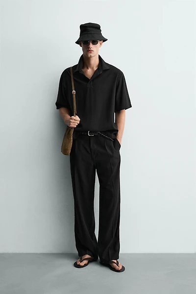 FLOWY RELAXED FIT PLEATED PANTS