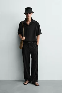 FLOWY RELAXED FIT PLEATED PANTS