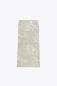 SEMI-SHEER STRUCTURED KNIT SKIRT