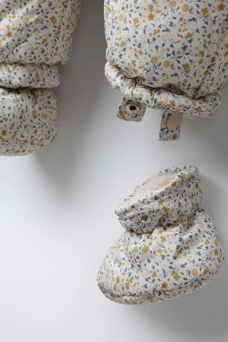 NYLON ROMPER WITH DETACHABLE MITTENS AND BOOTIES, FLORAL PRINT