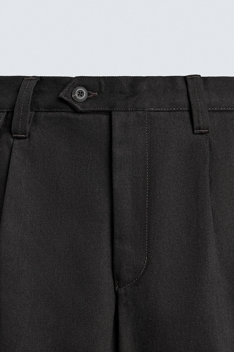 PLEATED BALLOON FIT JEANS