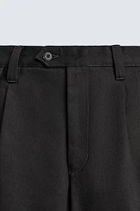 PLEATED BALLOON FIT JEANS