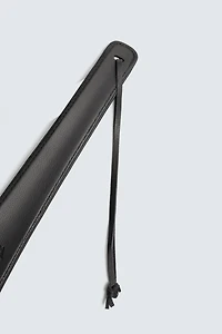 CHAUSSE-PIED EN CUIR