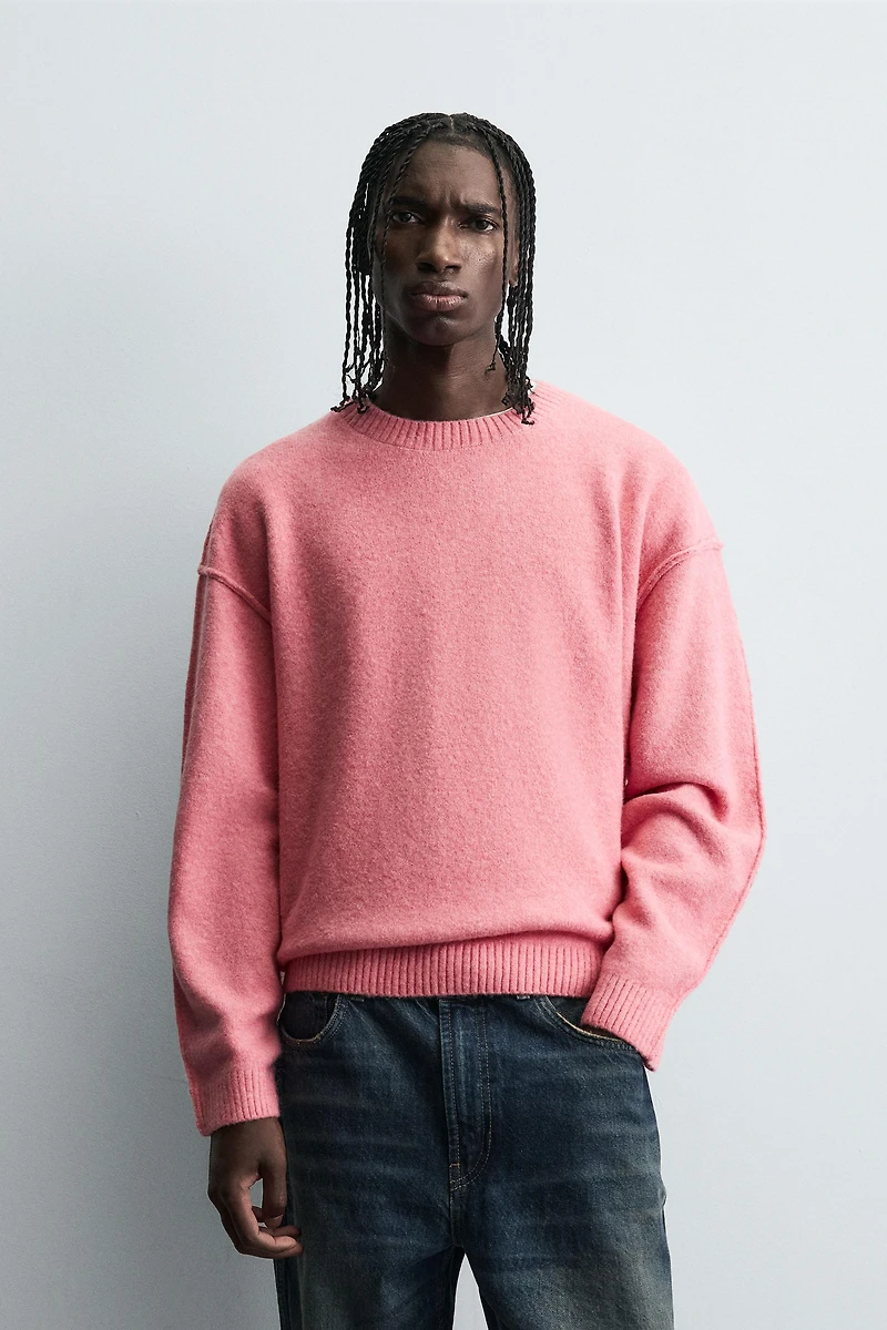 TEXTURED SWEATER WITH REVERSE EFFECT SEAMS