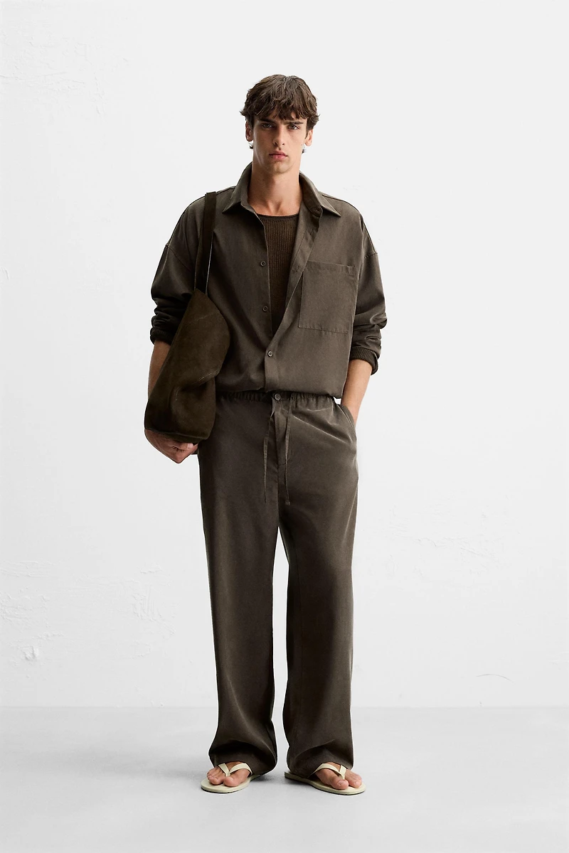RELAXED FIT FLOWY PANTS