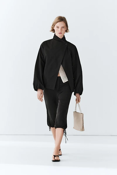 Veste technique à bouton latéral en coton