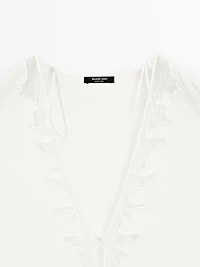 Flowing blouse with lace detail