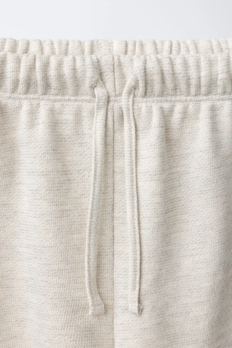 SHORT EN MOLLETON DENTELLE