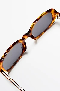 Oval tortoiseshell-effect sunglasses