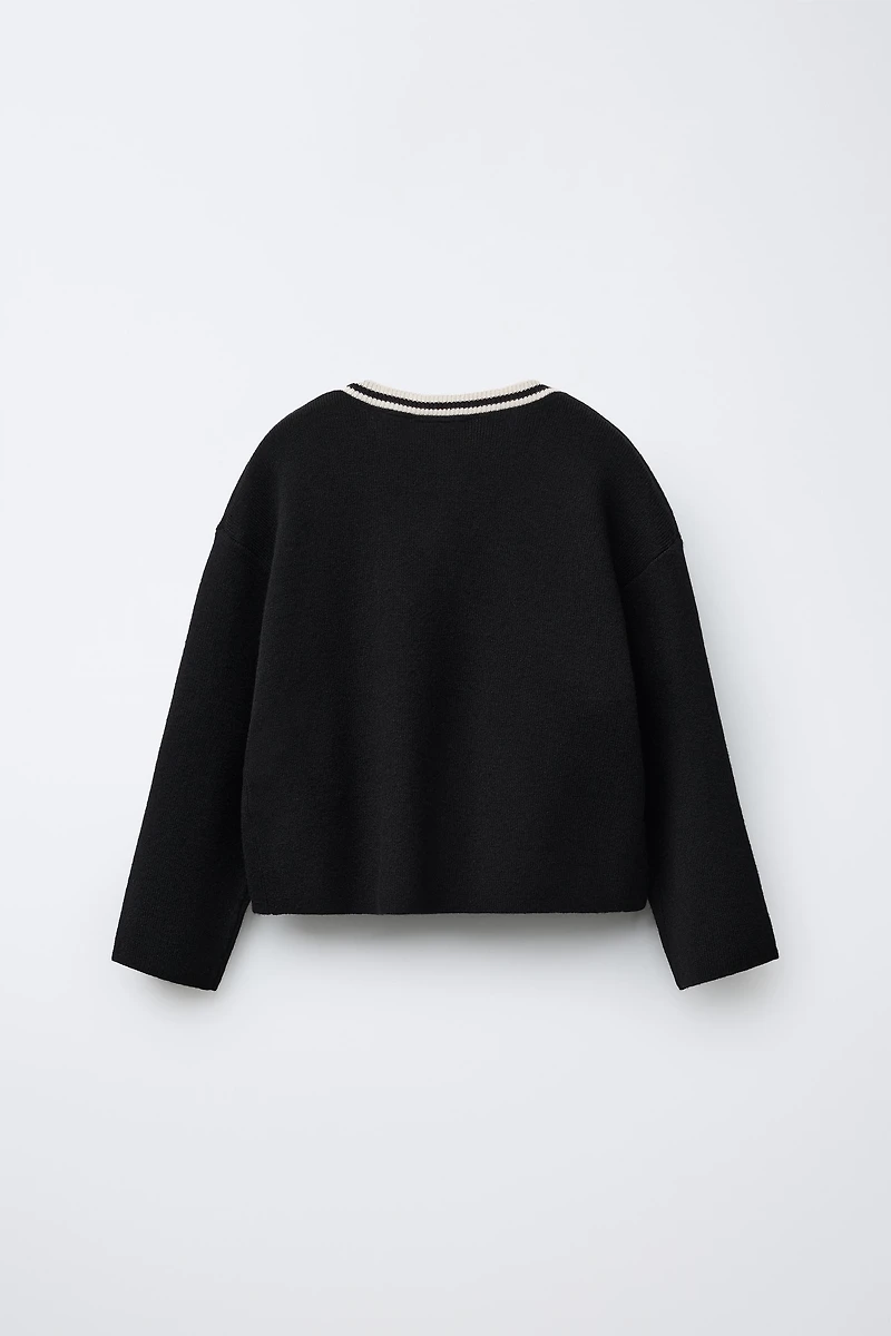 GILET EN MAILLE À NŒUDS