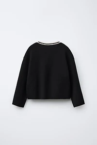 GILET EN MAILLE À NŒUDS
