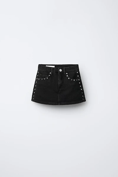 JUPE-SHORT EN JEAN À CLOUS