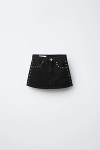 JUPE-SHORT EN JEAN À CLOUS