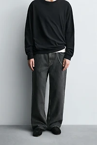 WAXED EFFECT BAGGY FIT JEANS