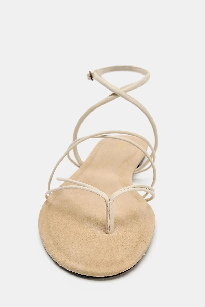 STRAPPY LEATHER FLAT SANDALS