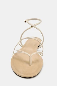 STRAPPY LEATHER FLAT SANDALS