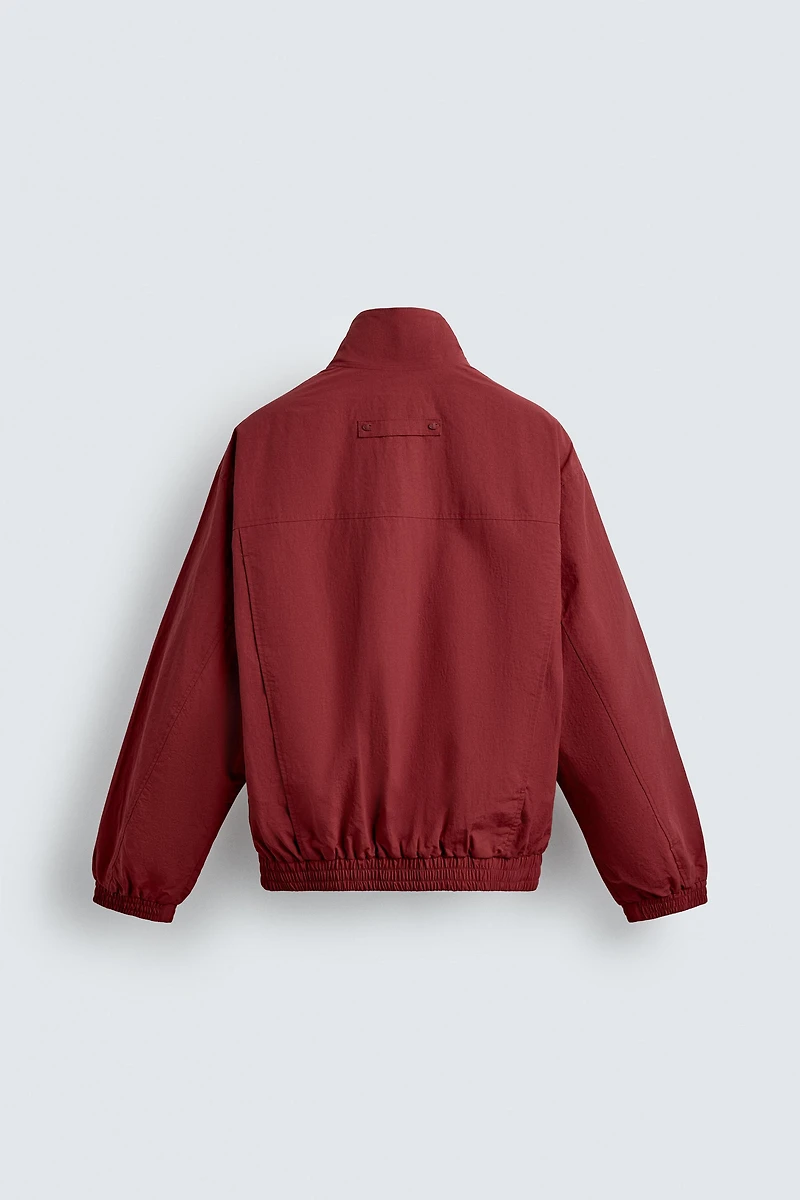 CHAMPION® X ZARA TECHNICAL PATCH JACKET