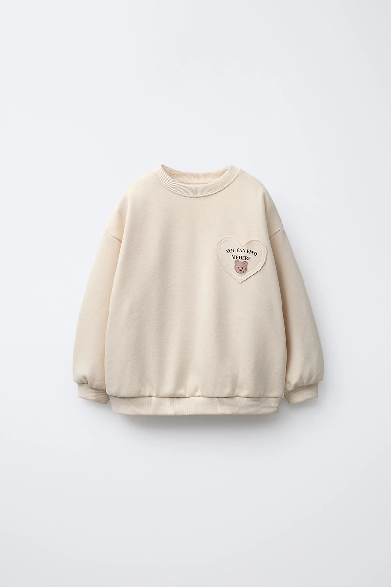 HEART POCKET SWEATSHIRT