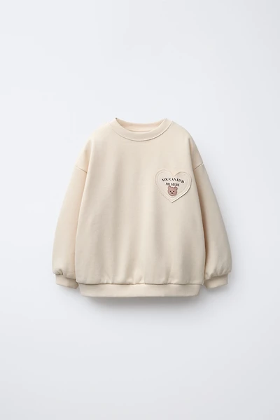 HEART POCKET SWEATSHIRT