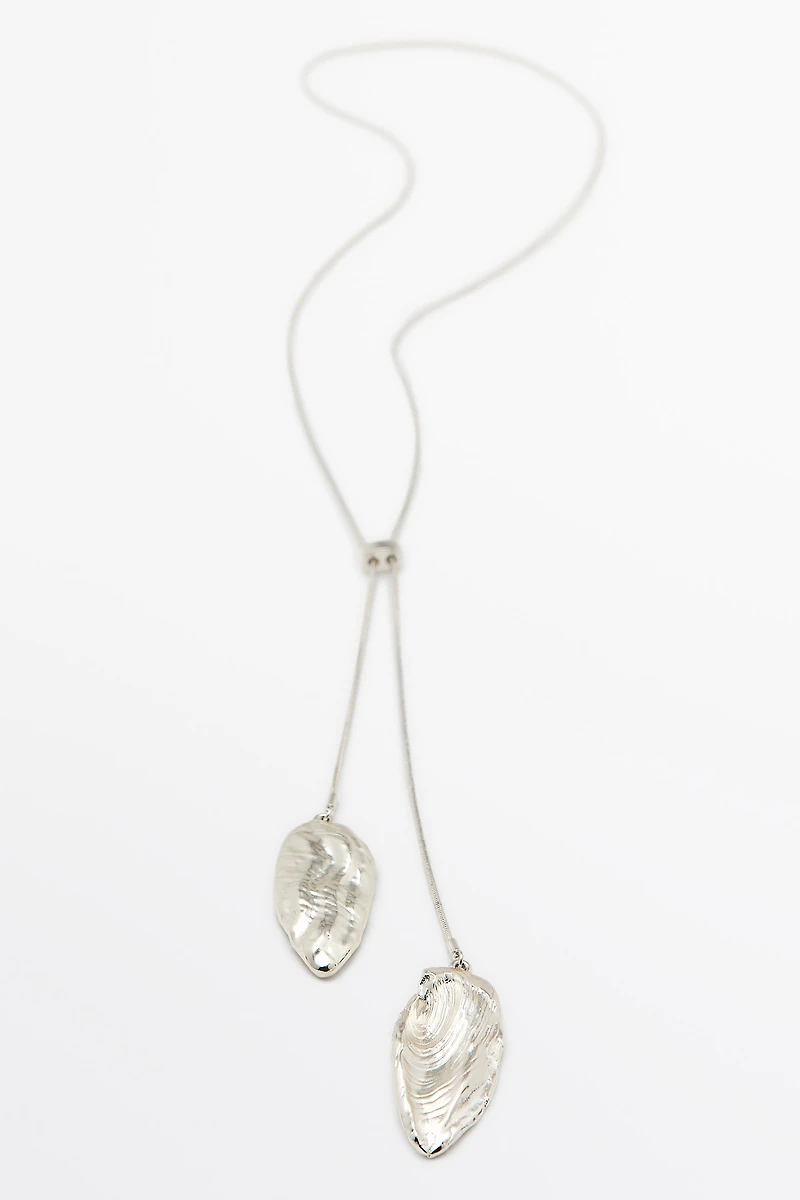 Collier pièces texturées réglable